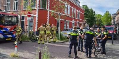 Vrouw gered uit brandende woning Schutterstraat